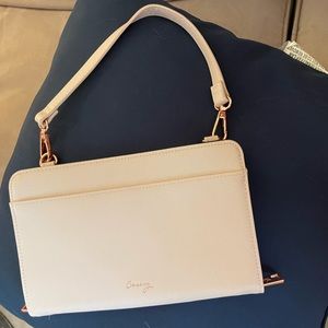 Casery travel clutch. Light pink and rose gold. 5.5” x 8.5” great condition.